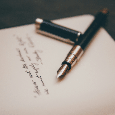 Fountain pen on stationery Photo by Álvaro Serrano on Unsplash
