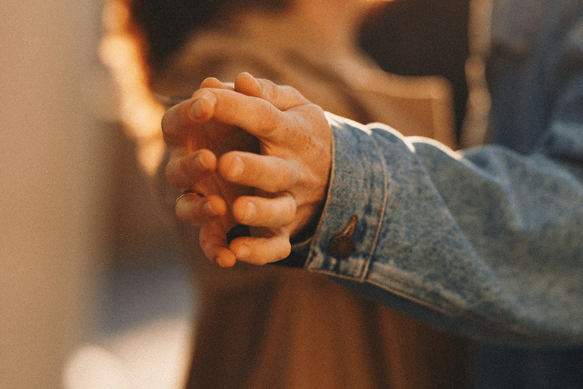 Couple with their hands touching Photo by Natalia Sobolivska on Unsplash
